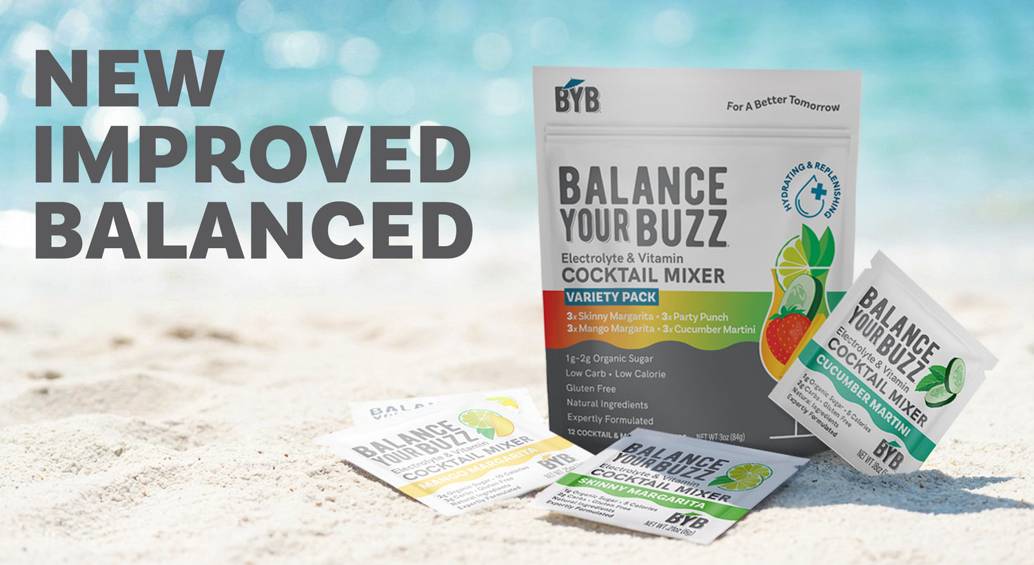 Balance Your Buzz cocktail mixer packets on a sandy beach with a blue sky background.